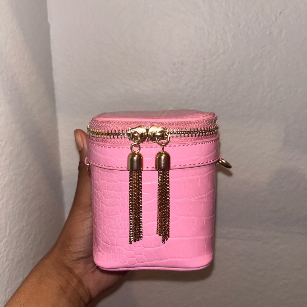 Pink and gold purse